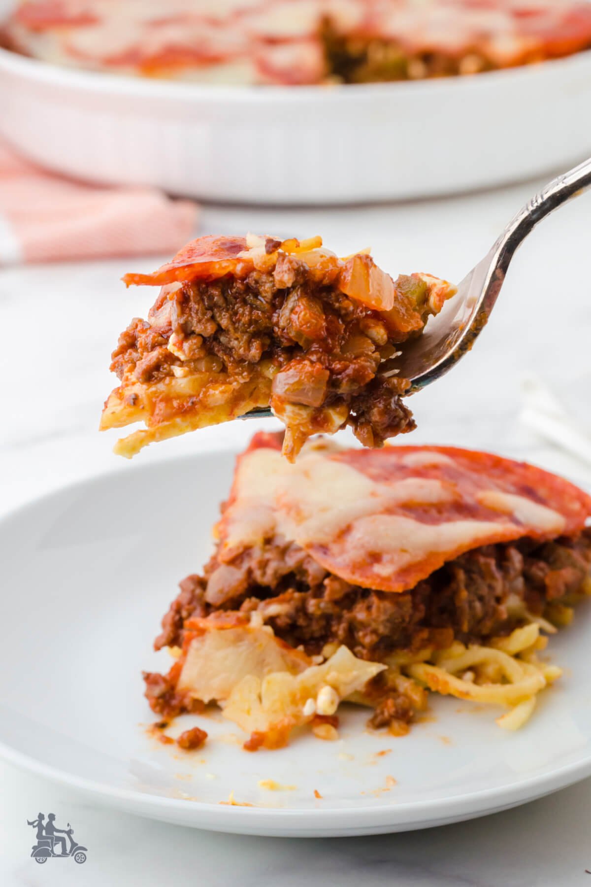 A forkful of the Italian hamburger spaghetti casserole. 