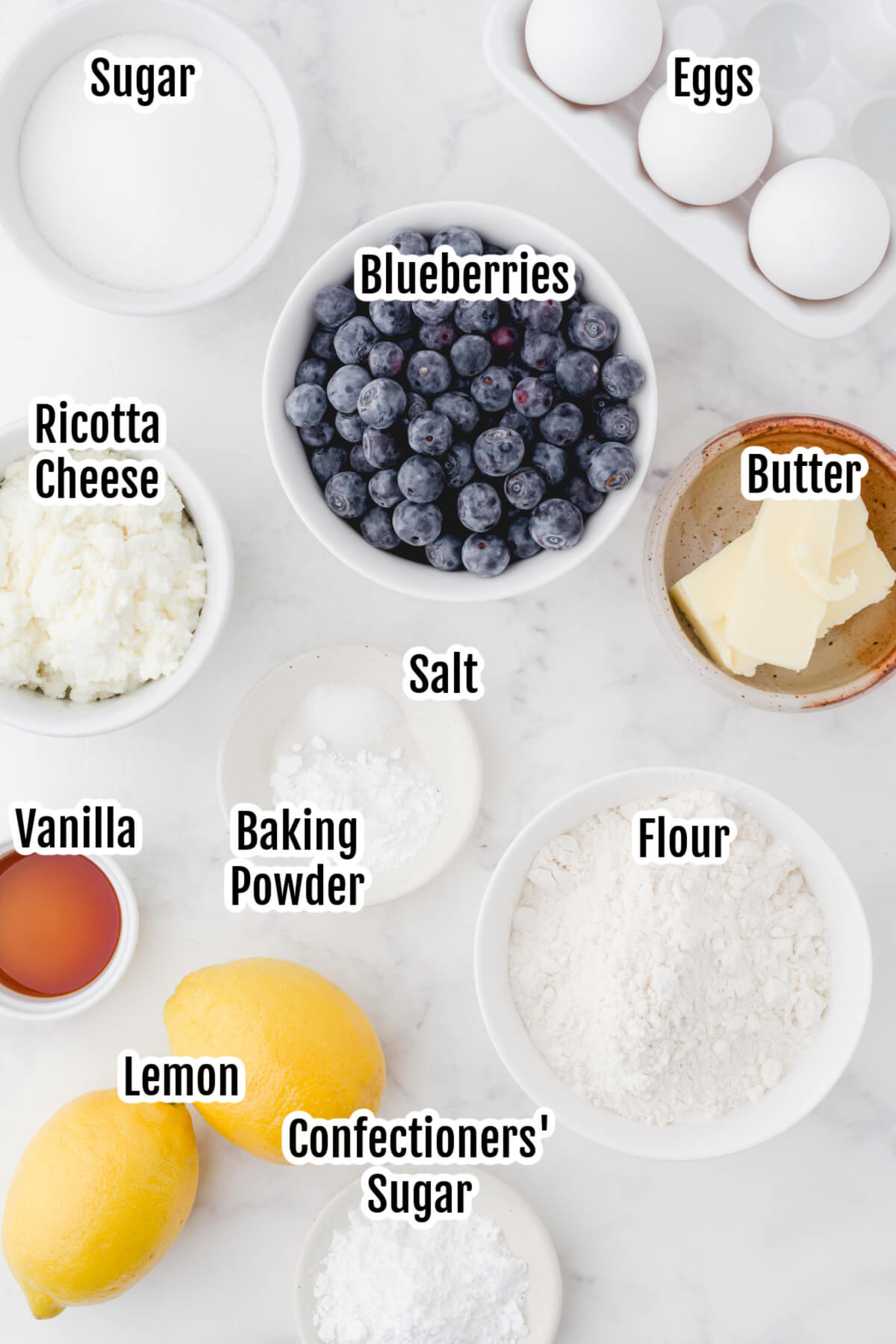 Image of the ingredients needed for making Lemon Blueberry Pound Cake. 