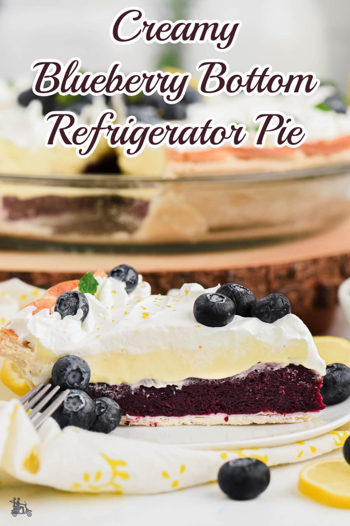 A slice of blueberry pie with whipped cream. 