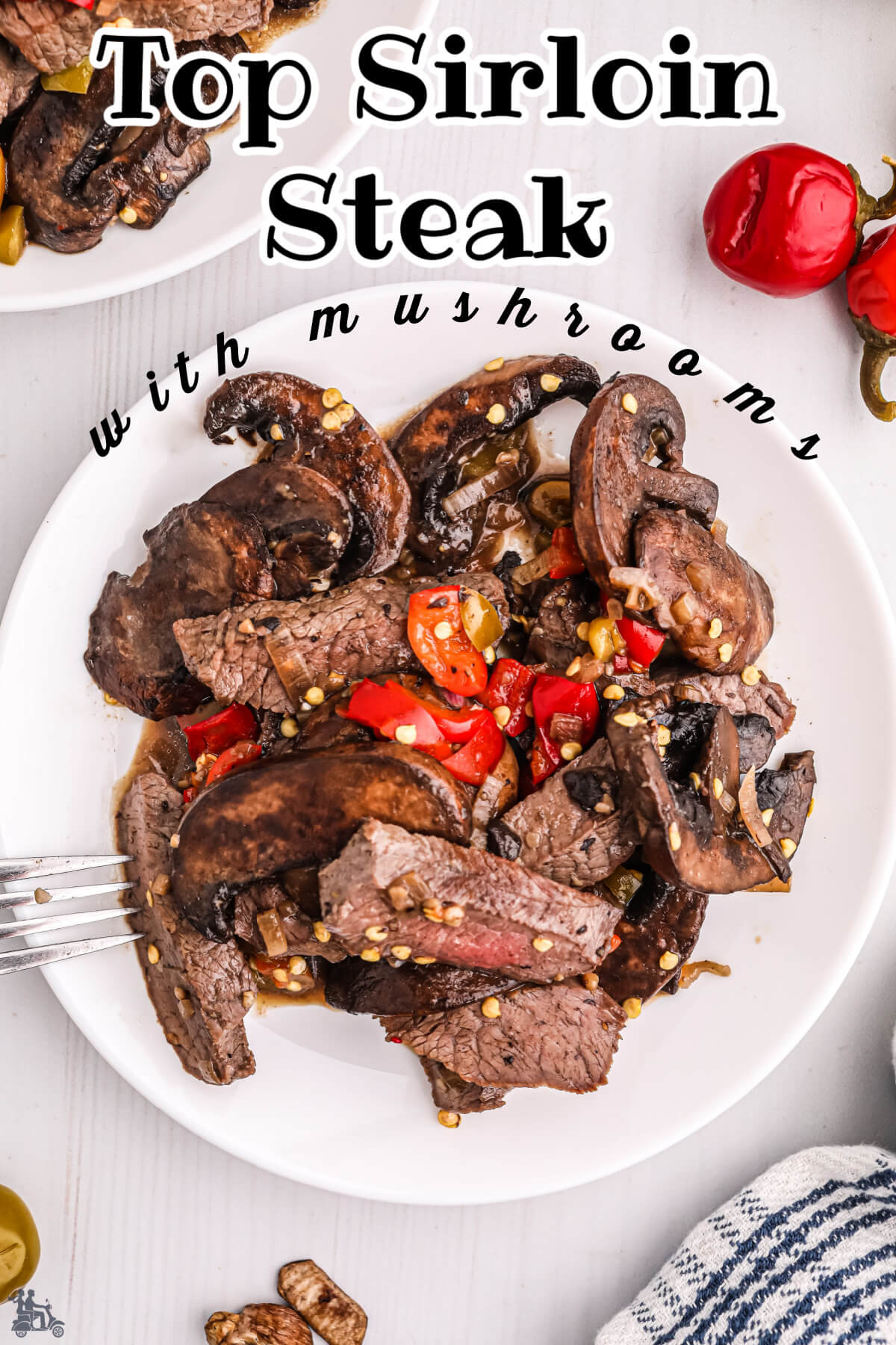 Pan seared top sirloin steak with mushrooms and sweet cherry peppers. 