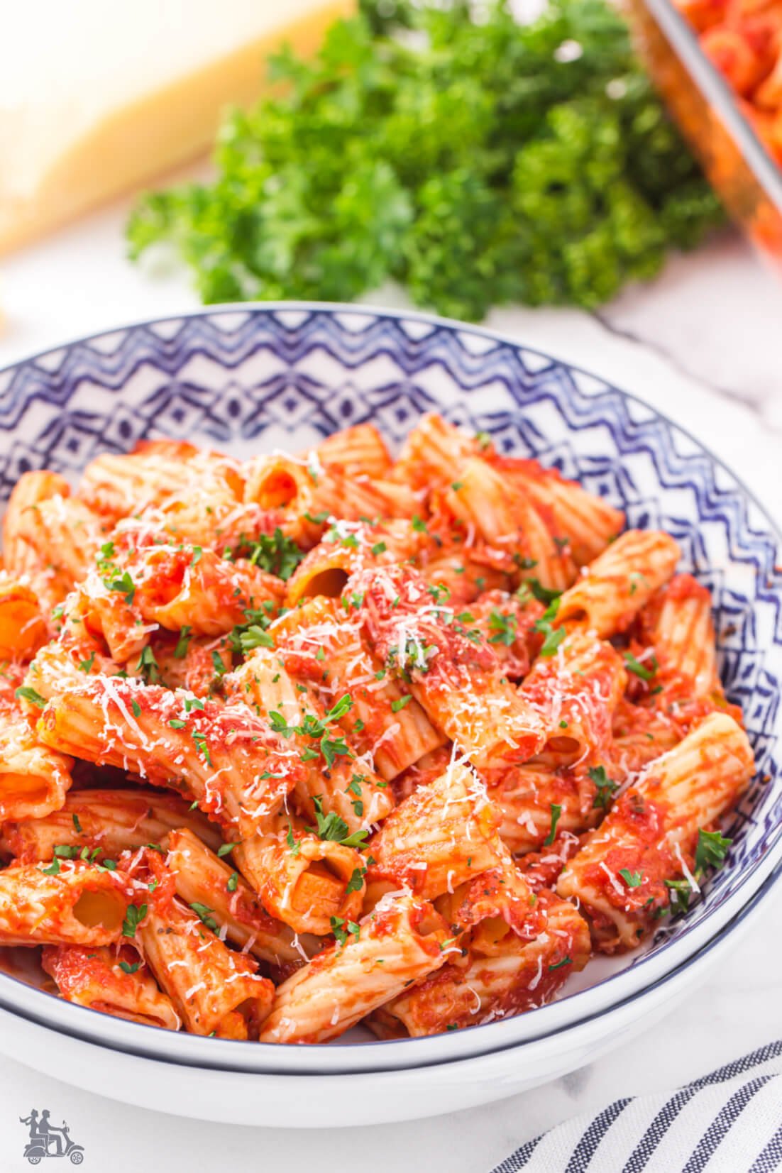 A bowl of marinara sauced rigatoni bake recipe. 