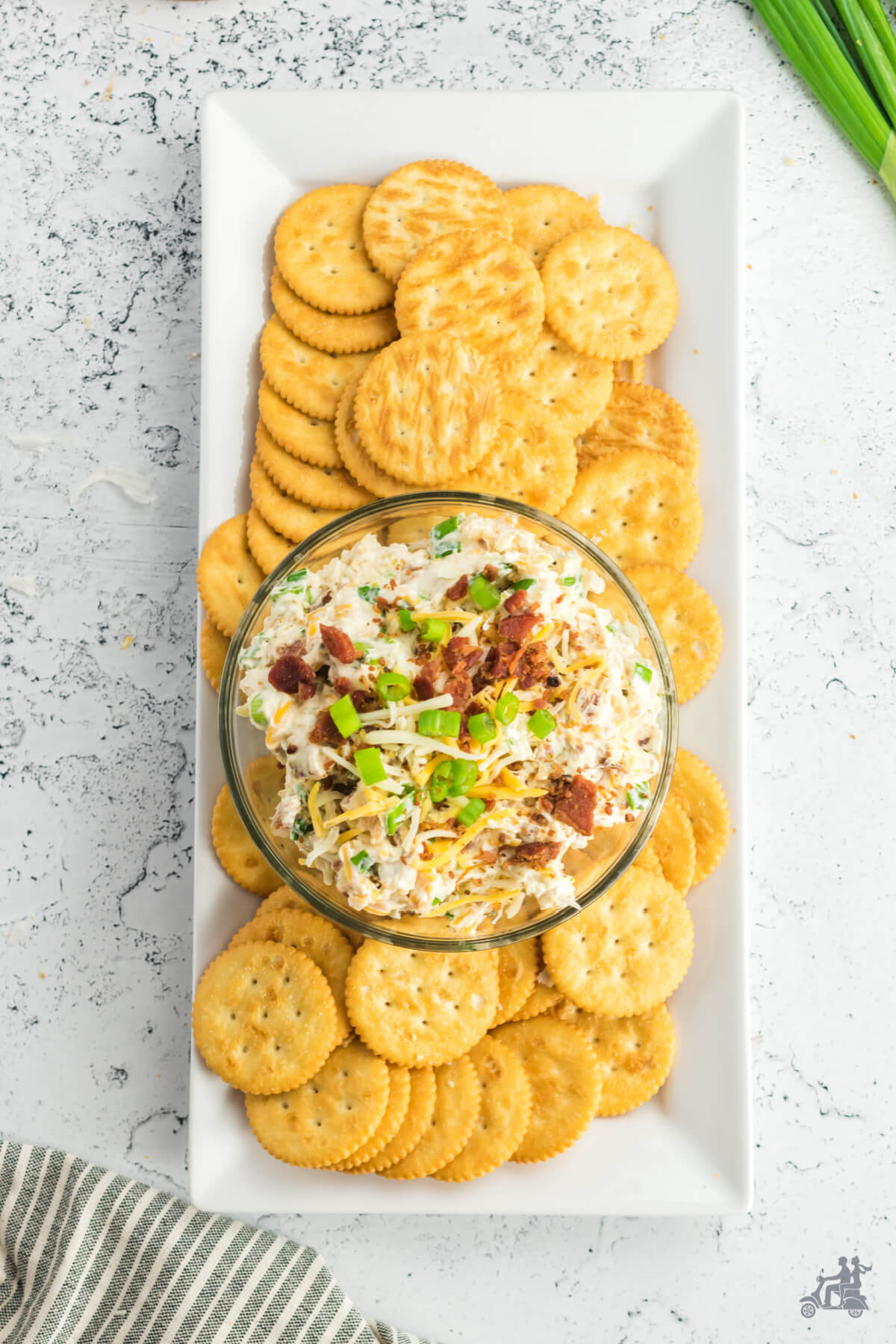 Overhead view of the Cream Cheese Dip with Ritz Crackers surrounding it. 