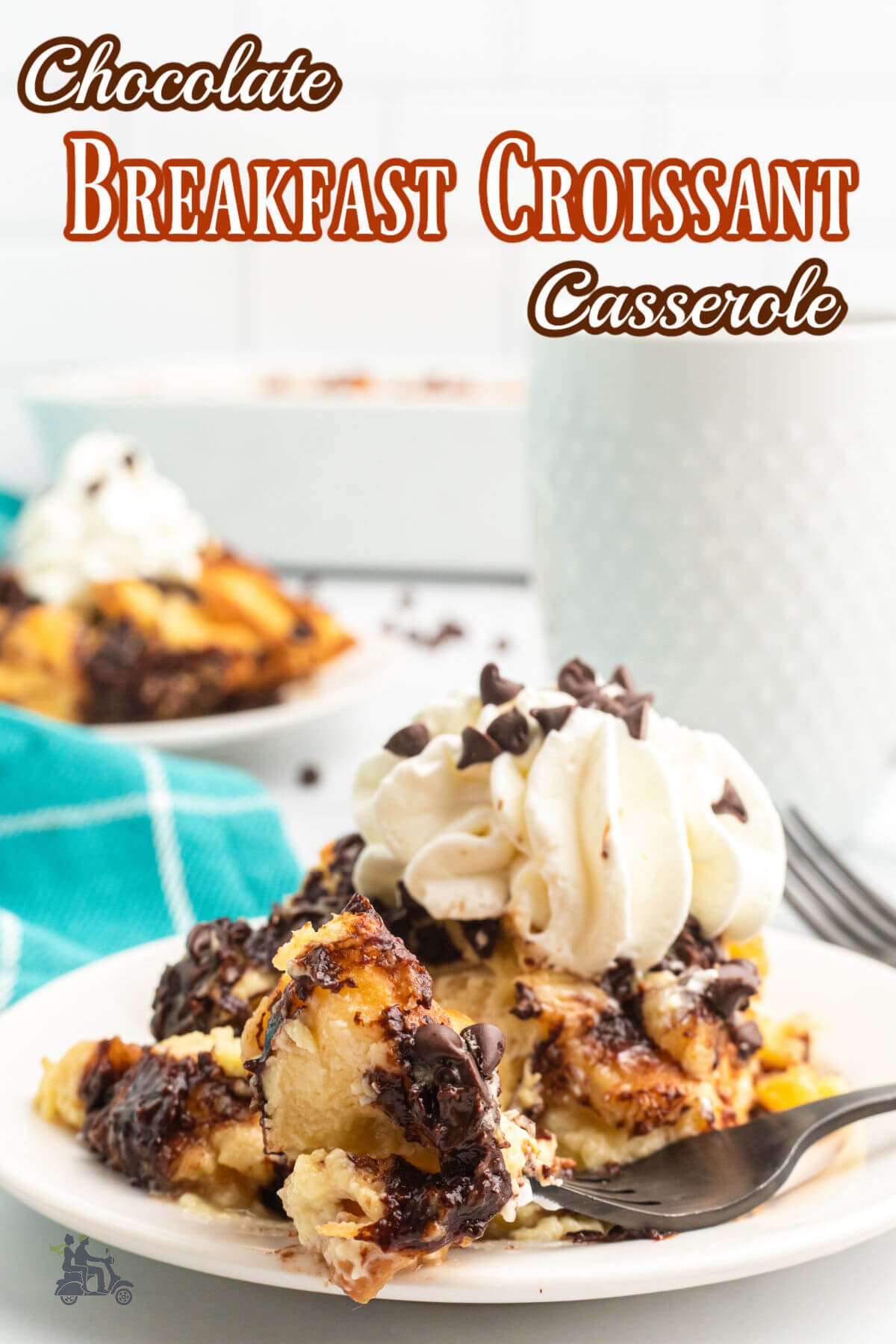 A white plate with a serving of chocolate croissant breakfast casserole. 
