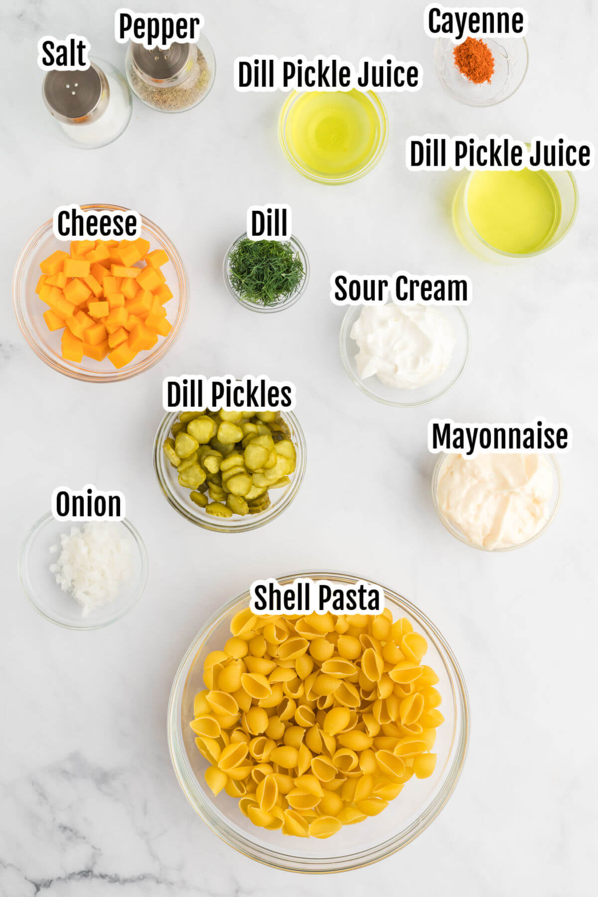Image of the ingredients needed for Dill Pickle Pasta Salad recipe. 