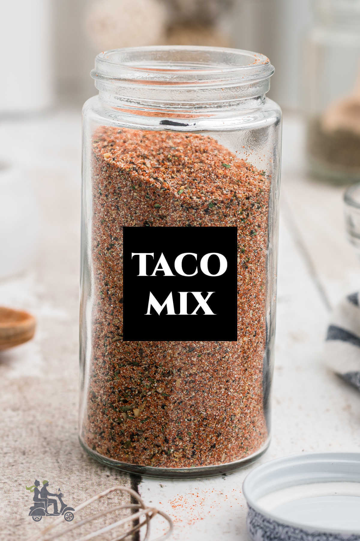 Homemade taco seasoning mix in a glass jar. 