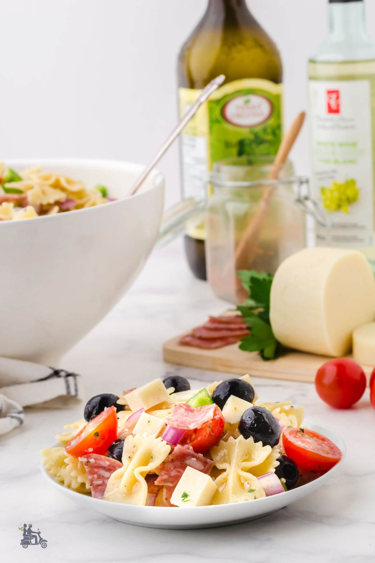 Farfalle pasta made into an Italian pasta salad with homemade Italian salad dressing. 