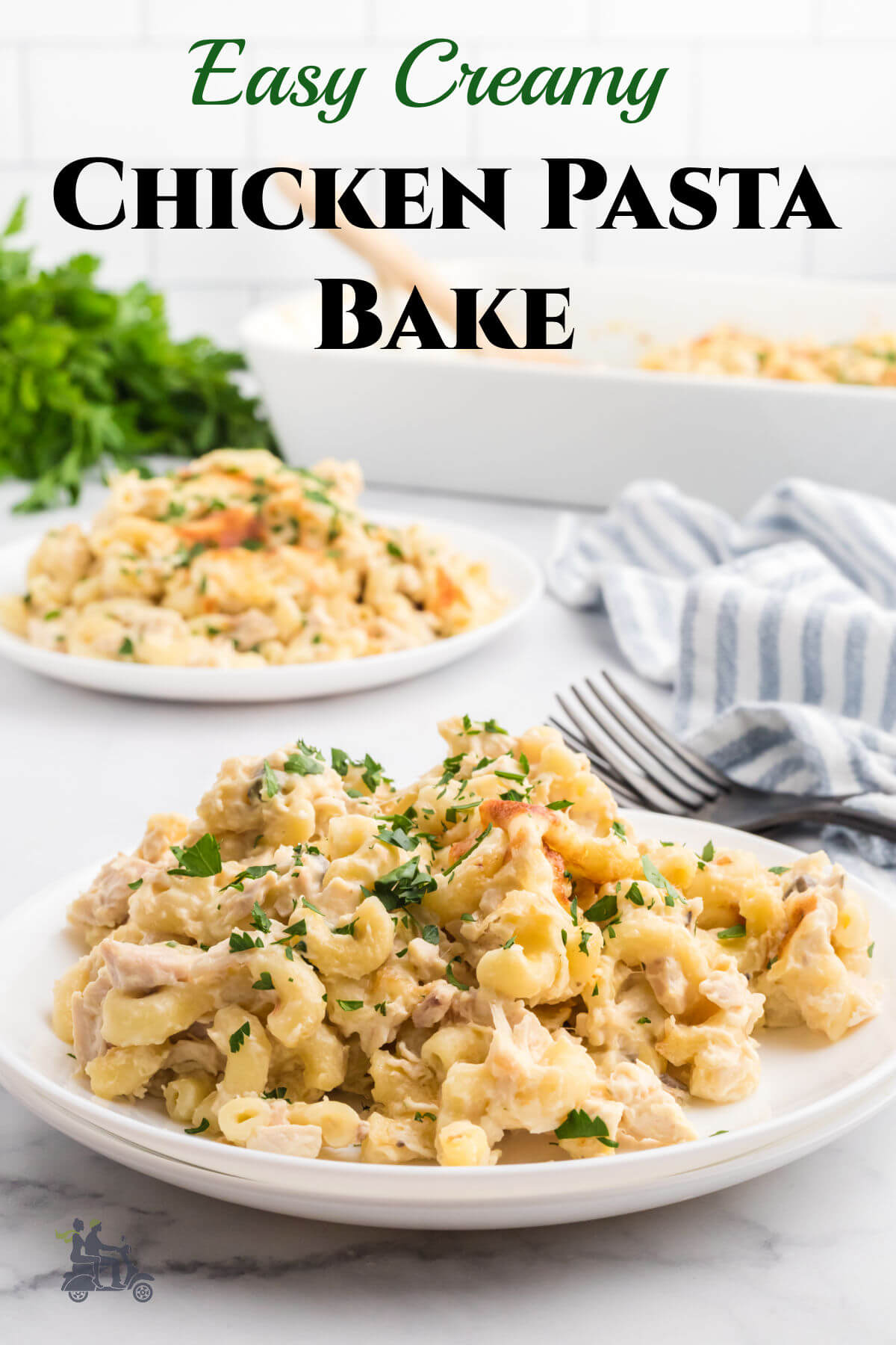 A plate with a serving of creamy chicken pasta bake. 