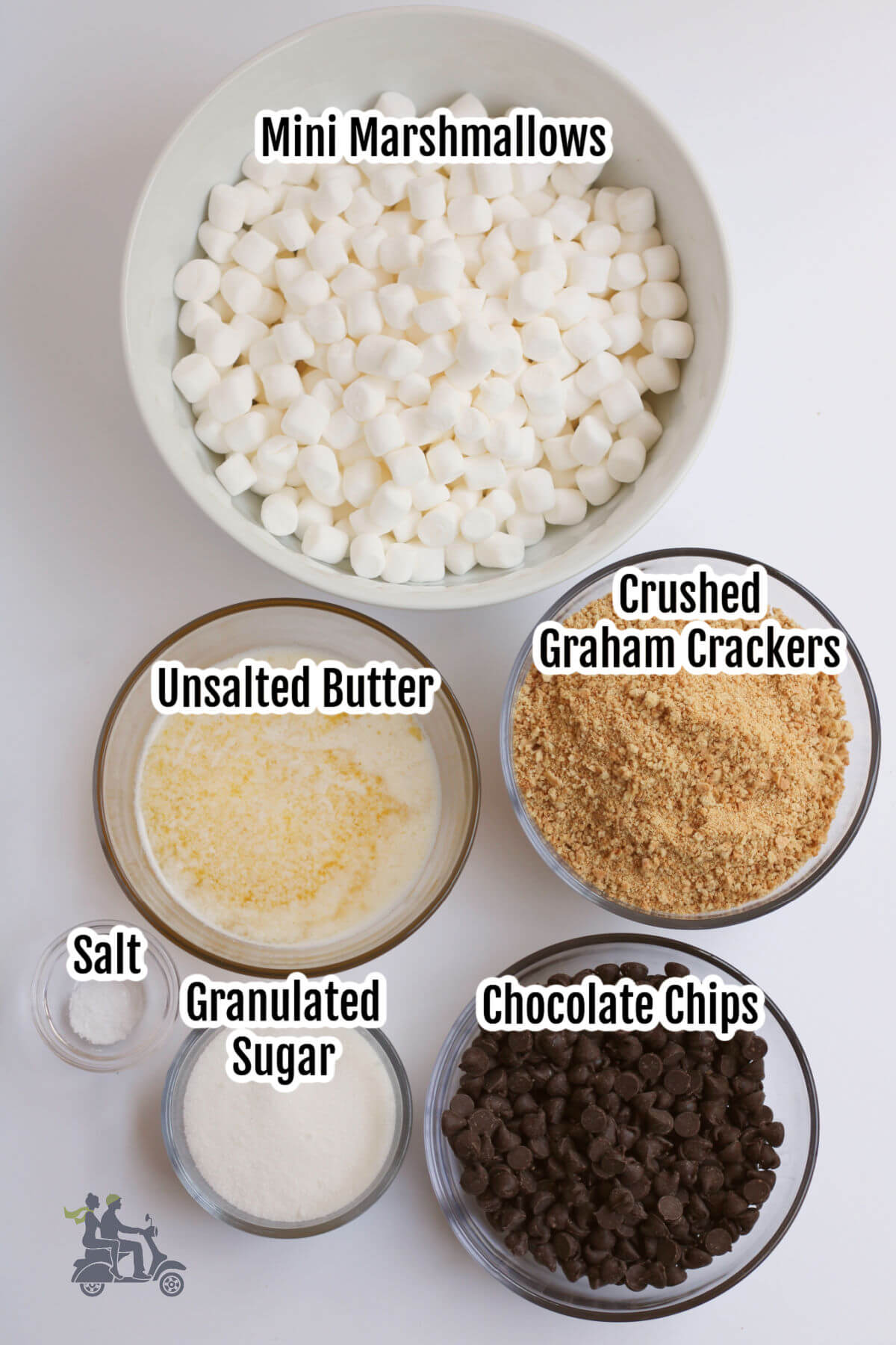 Image of the ingredients needed for S'mores bars with marshmallows and chocolate chips. 