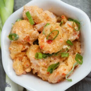 Spicy PF Chang's copycat Dynamite Shrimp in a white goblet.