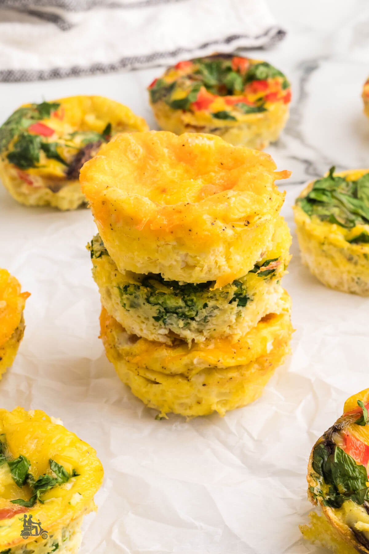 Mini frittata egg cups stacked on the table ready to serve. 