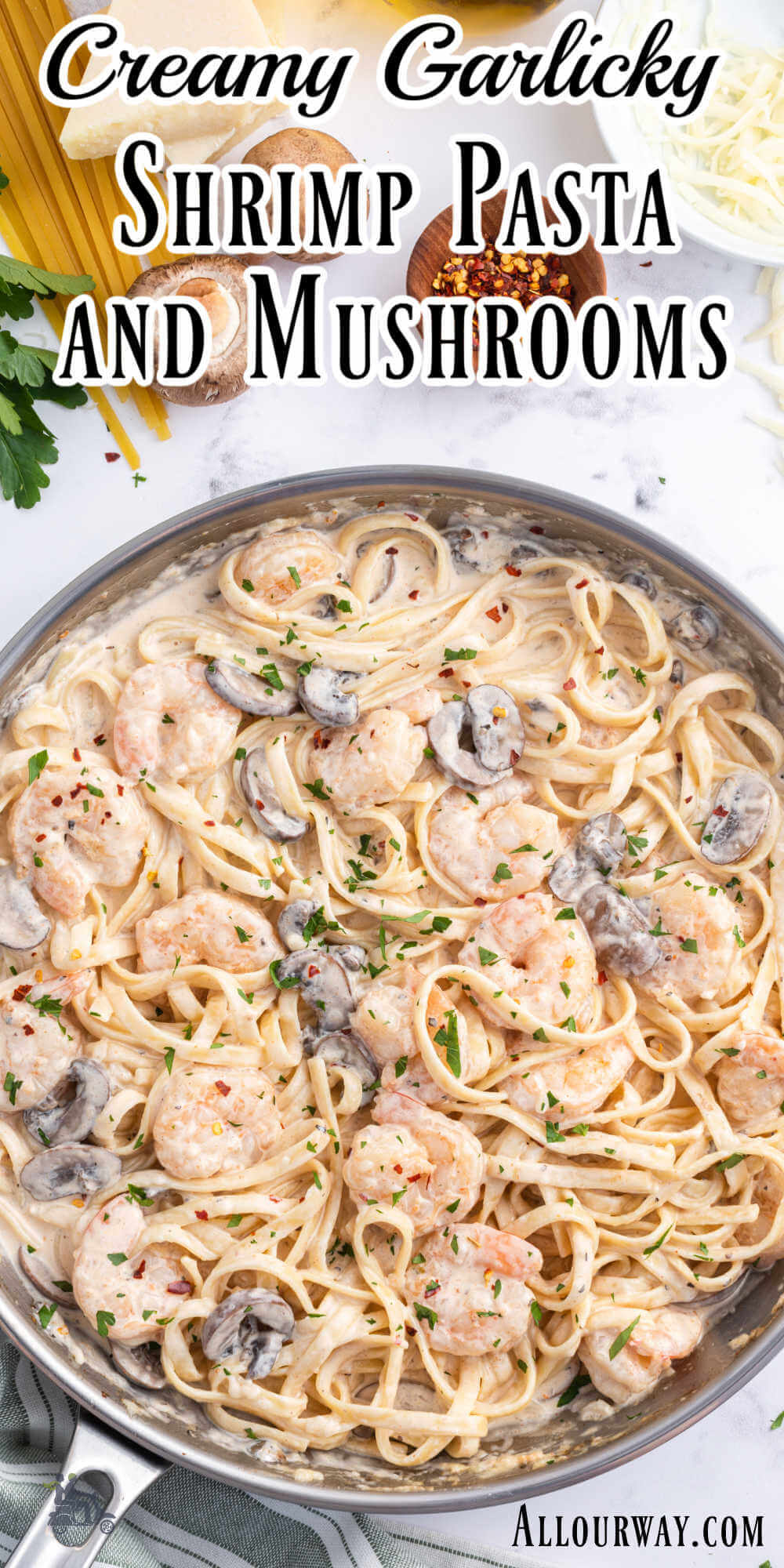 Pinterest image with title overlay for creamy garlicky shrimp pasta and mushrooms recipe.