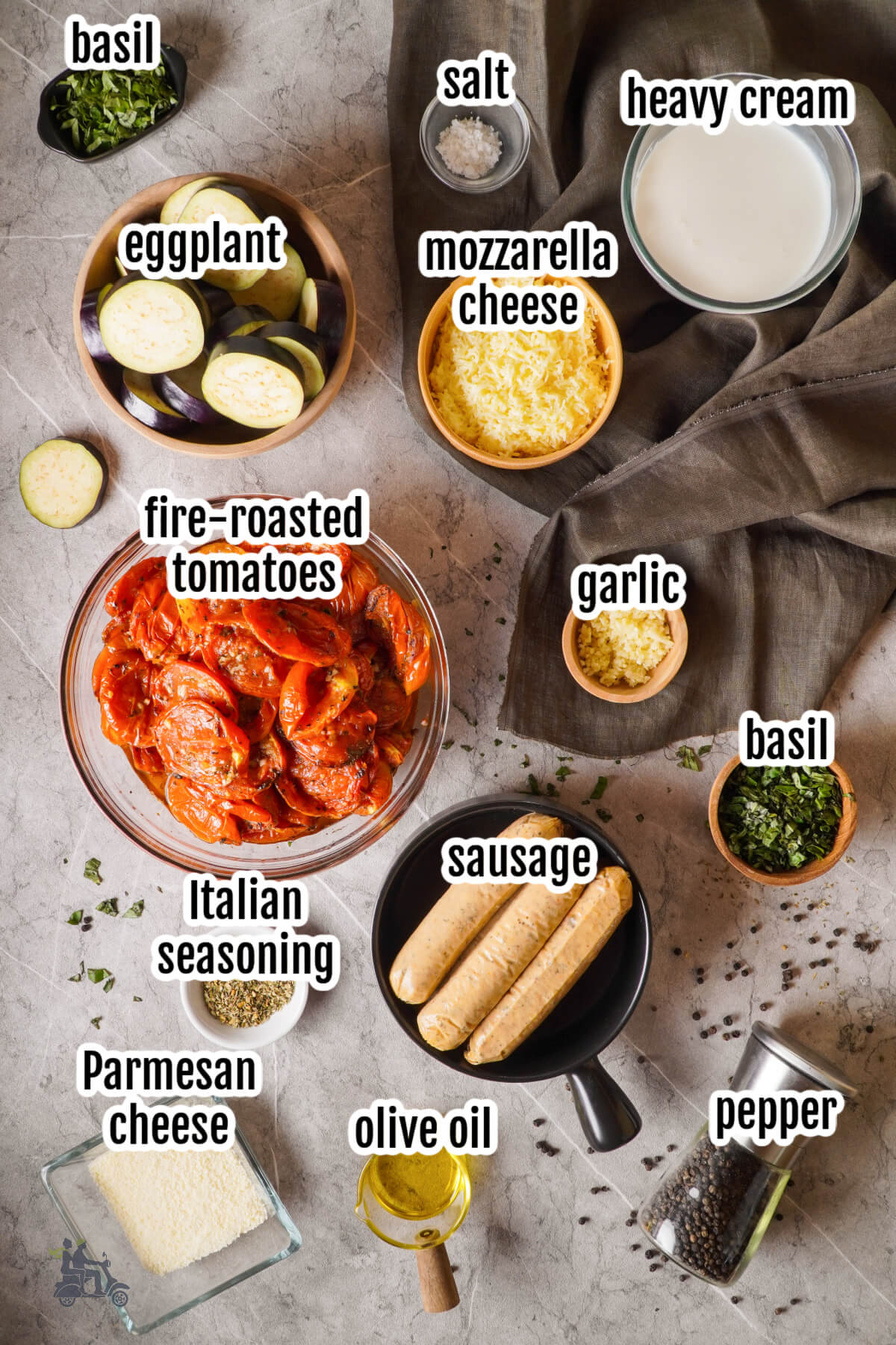 Image of the ingredients needed to make Italian sausage baked eggplant parmesan and mozzarella cheese. 