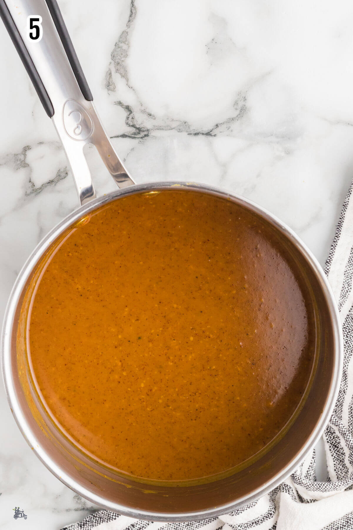 Final step of making the Carolina BBQ Sauce in a saucepan. 