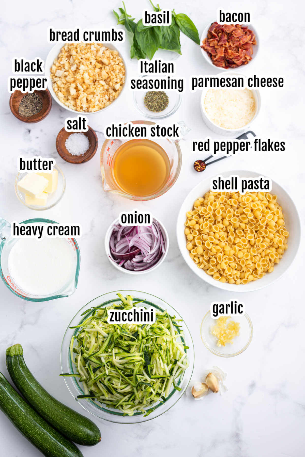 Image of the ingredients needed to make creamy zucchini sauce for pasta. 