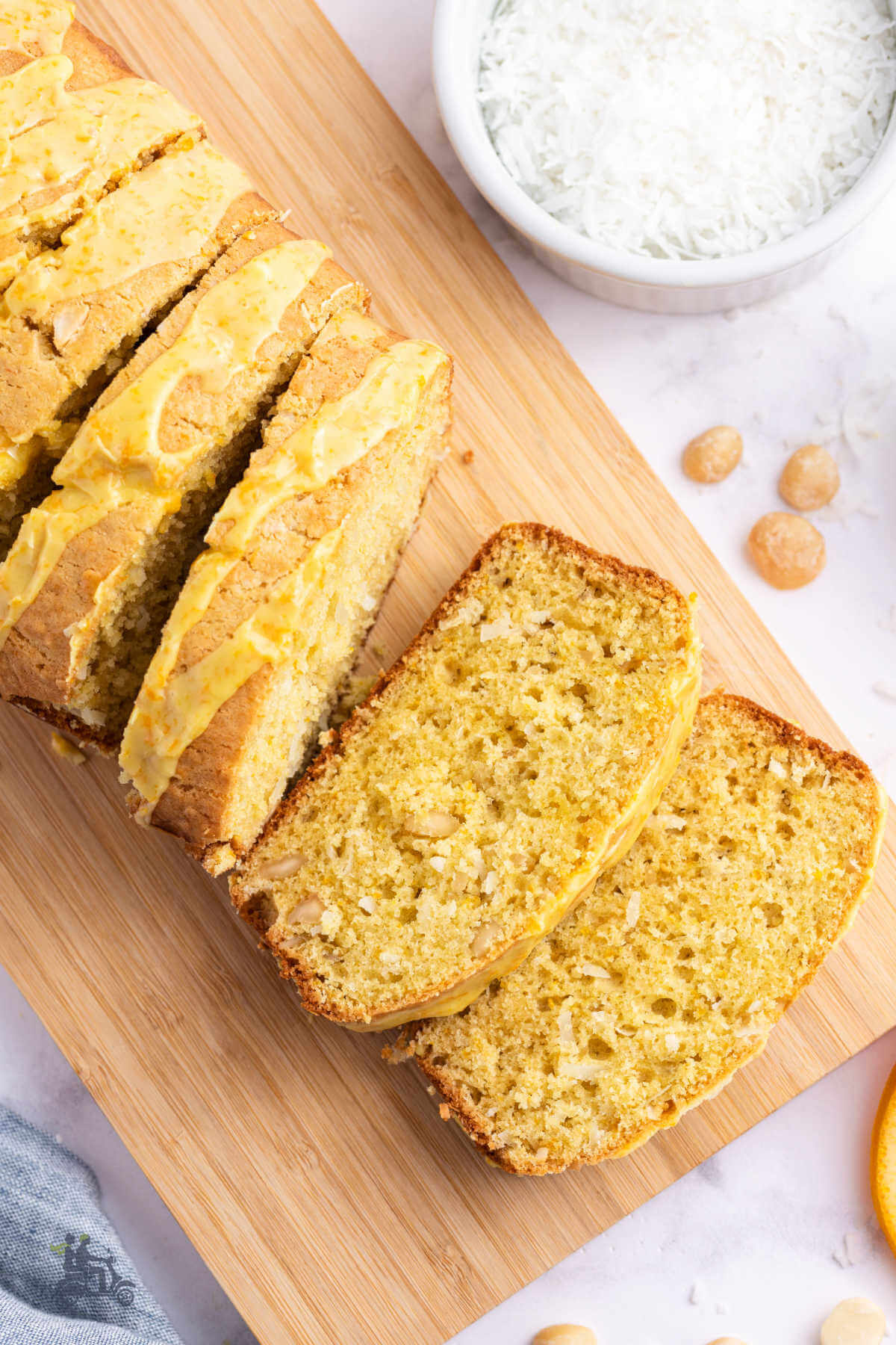 Overhead view of an Orange Glazed Coconut Macadamia Nut Quick Bread. 