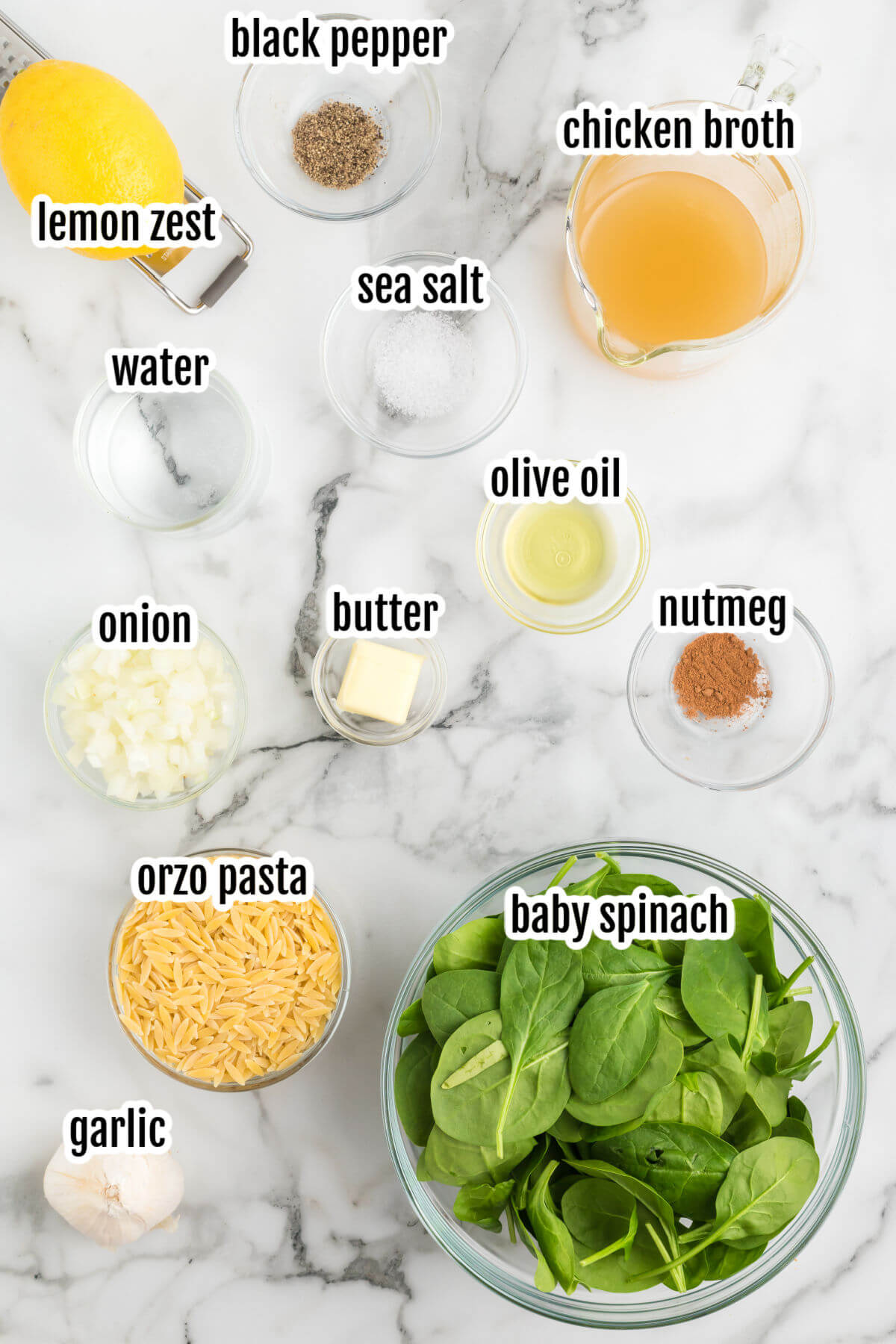 Image of the ingredients needed to make the creamy orzo pasta with lemon spinach risotto. 