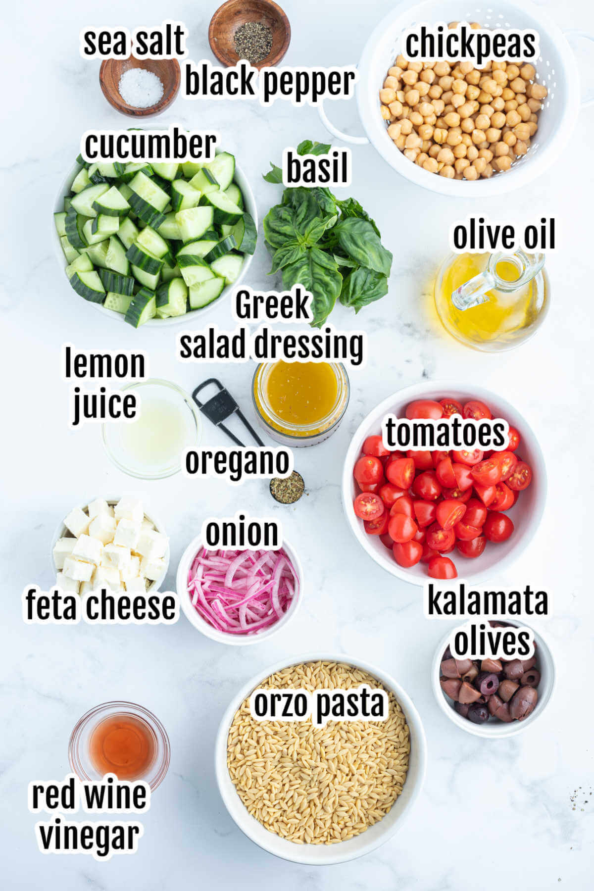 Image of the ingredients needed for making the Greek Orzo Pasta salad. 