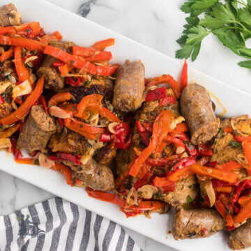 Chicken and Sausage cooked with red peppers in a spicy sauce to make the Italian Chicken Scarpariello.