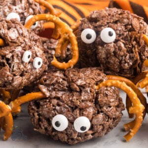 Halloween spiders mad with cocoa krispie and pretzels for legs.