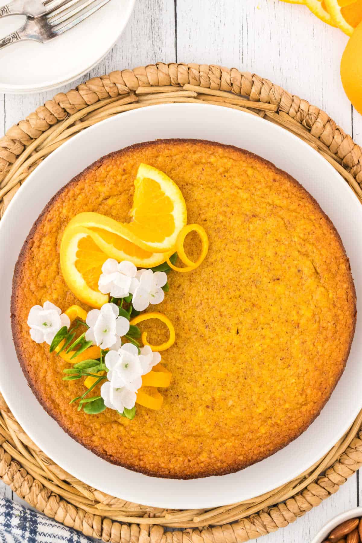 No-Gluten Whole Orange Almond Cake on a white plate.
