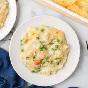 Cottage pie inspired casserole made with seafood and topped with mashed potatoes.
