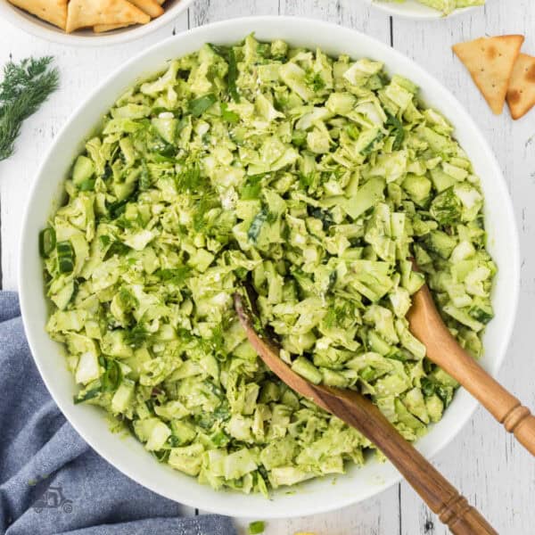 Fresh green cabbage salad made with a homemade green goddess dressing.