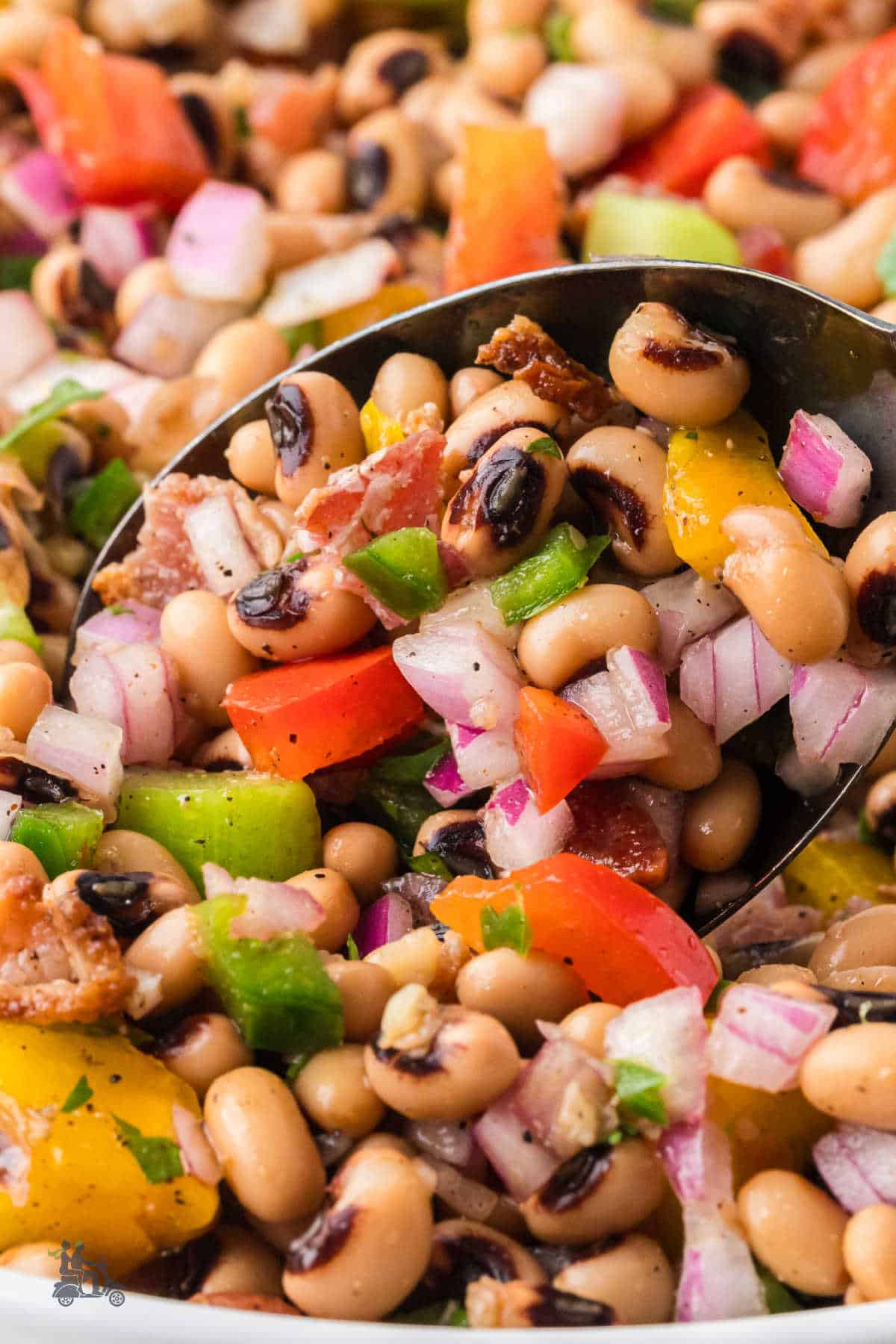 Close up the bean salad made with black-eyed peas and peppers. 