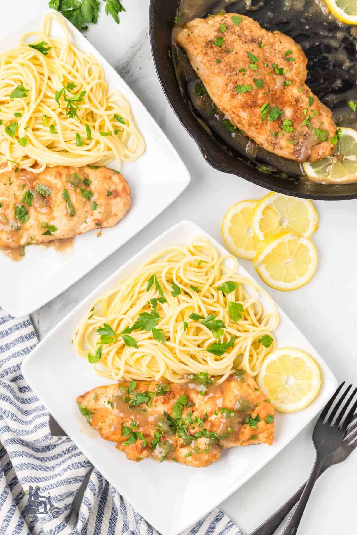 Quick and easy chicken dinner served scallopini style with spaghetti and lemon sauce. 