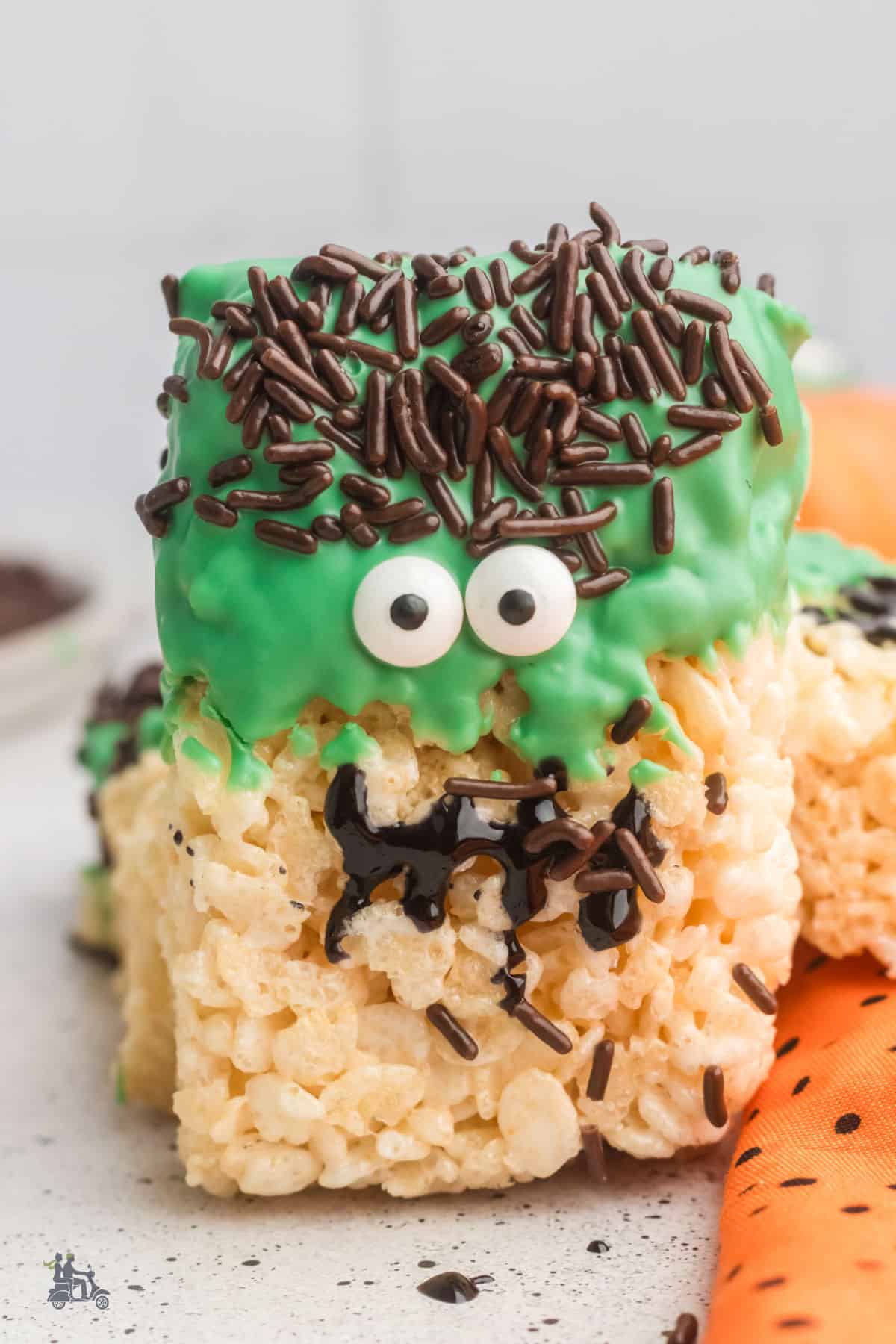 A closeup of a standing-up Frankenstein made from Rice Krispies and mini marshmallows. 