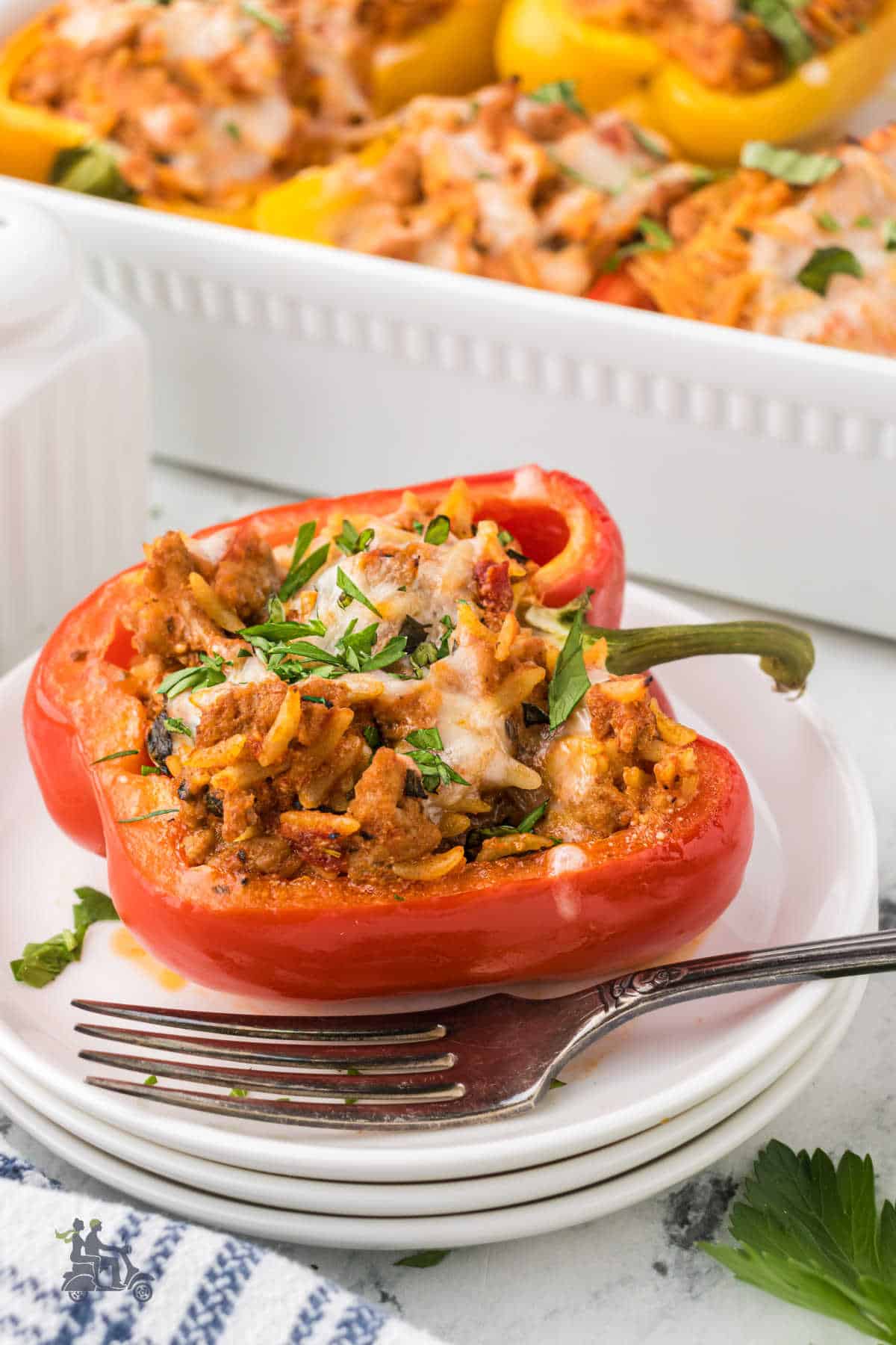 Baked bell pepper stuffed with pasta, ground turkey sausage, and mixed with marinara sauce and cheese. 