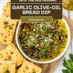 A Pinterest share image with a title overlay for the Garlic Olive Oil Herb Bread Dip recipe