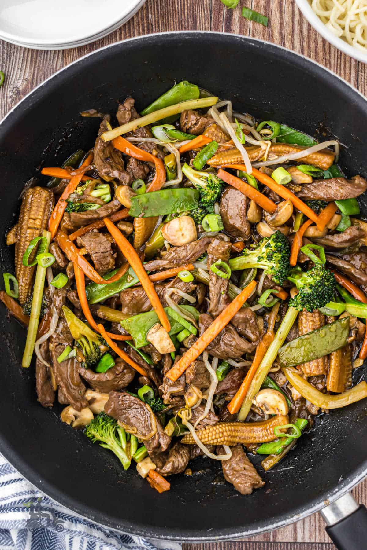 The chop suey with vegetables and beef are glazed with the sauce and ready to be served.