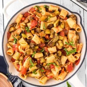Dutch oven filled with rigatoni made alla Norma.