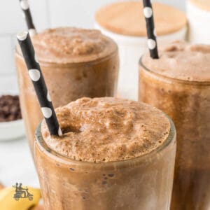 Three parfait glasses filled with espresso banana smoothie recipe.