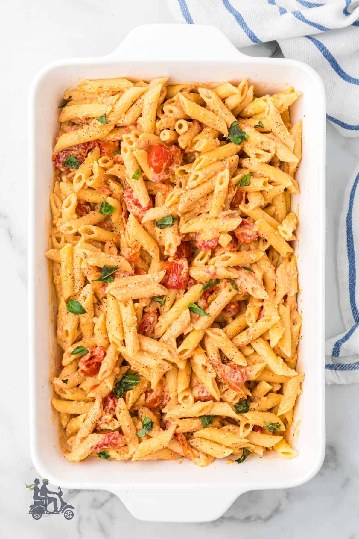 Seasoned Boursin cheese and grape tomatoes tossed with penne pasta for an easy weeknight dinner.