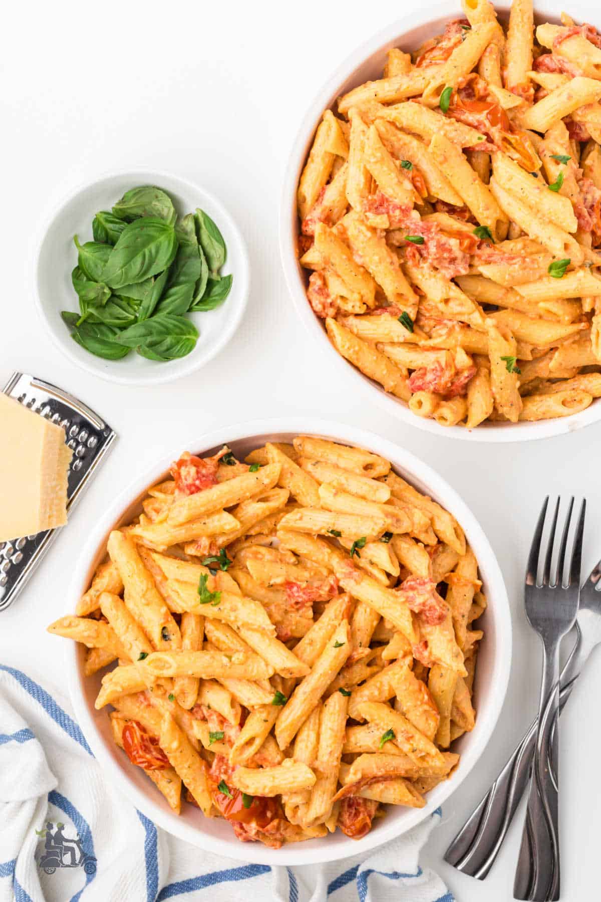 An easy weeknight meatless dinner favorite is made with boursin seasoned cheese, roasted with grape tomatoes for an easy pasta sauce. 