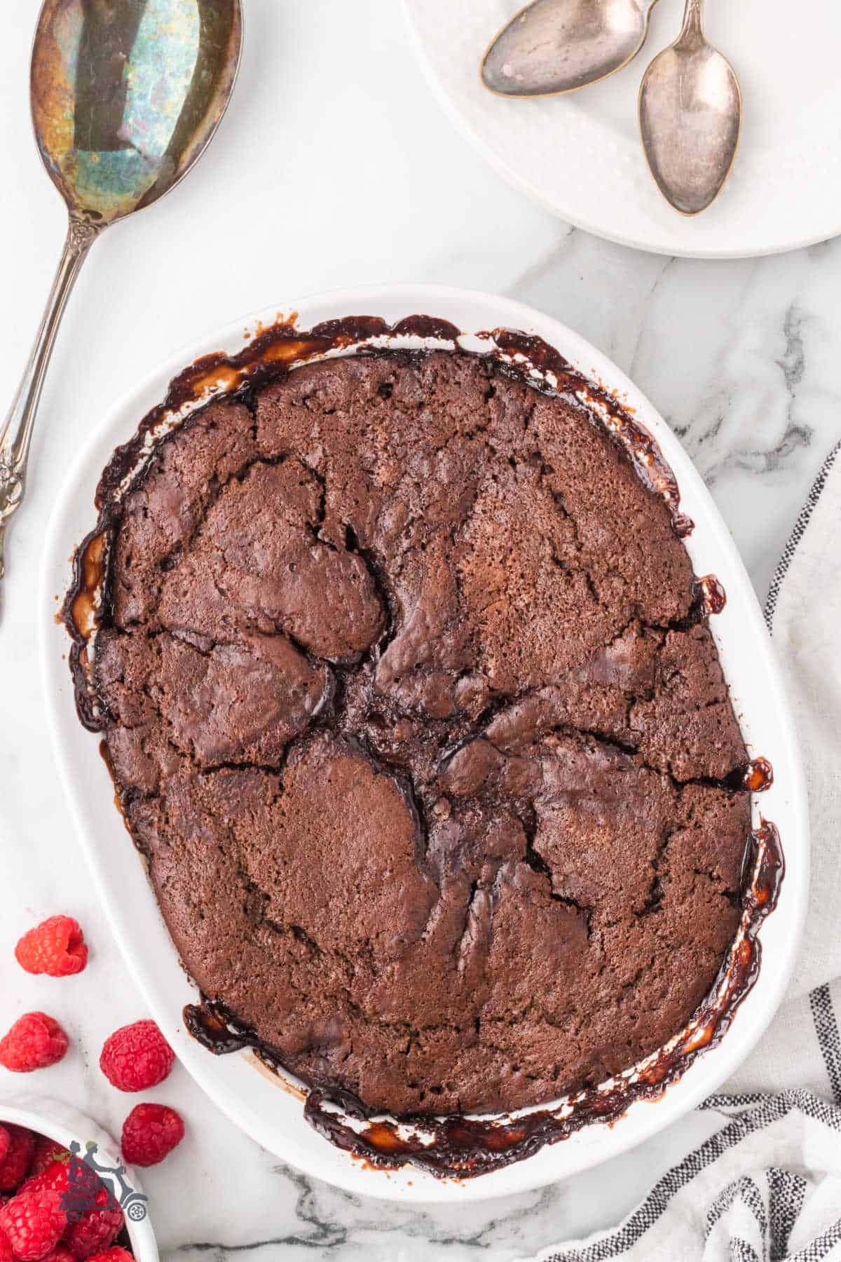 Two-layer chocolate pudding cake with sauce and laced with amaretto liqueur. 