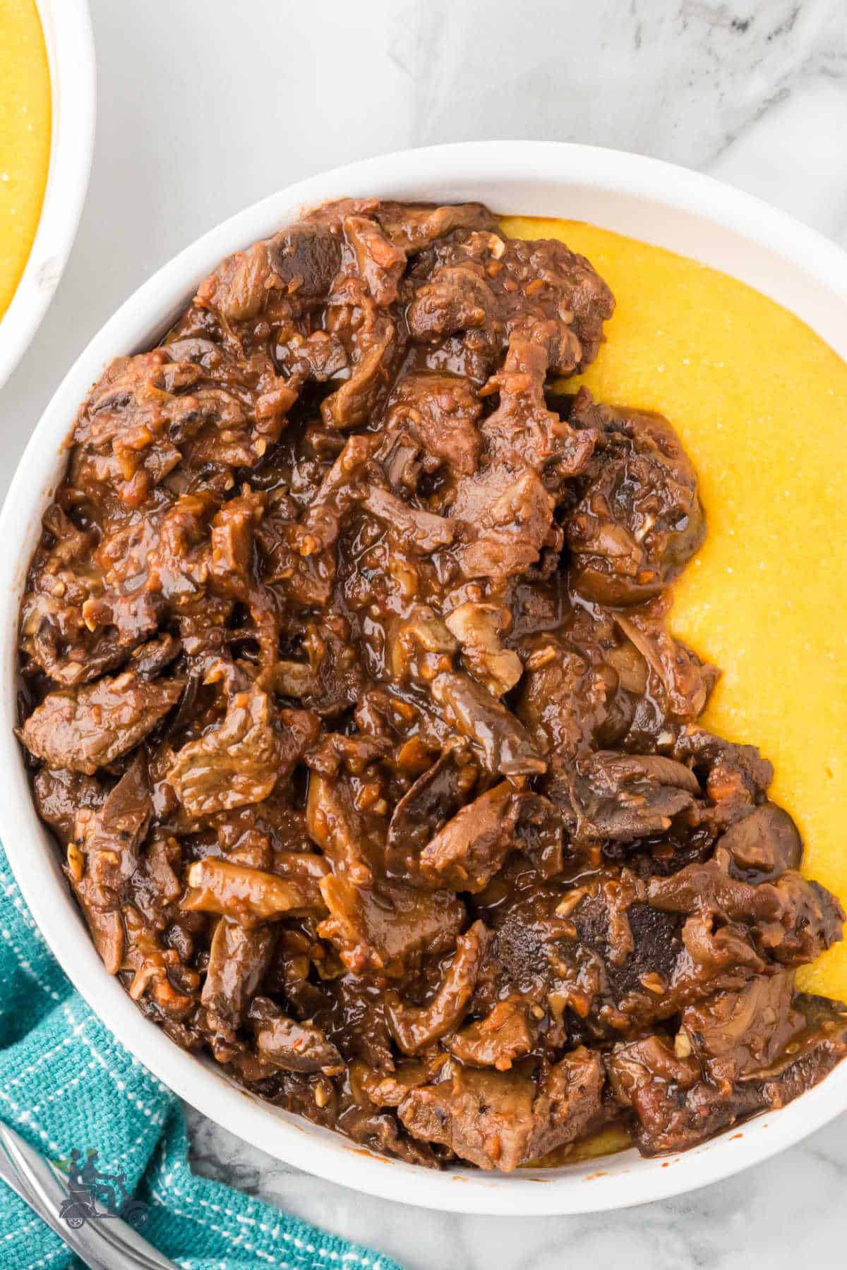 Vegetarian Mushroom Ragù served over golden polenta. 