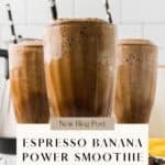 Three glasses filled with creamy coffee banana protein smoothie with chia seeds.