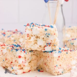 Rice Krispie Bars decorated with Patriotic red, white, and blue sprinkles.