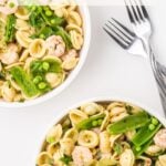 A long Pinterest image with a title overlay for the Lemon-Herb shrimp pasta salad recipe.
