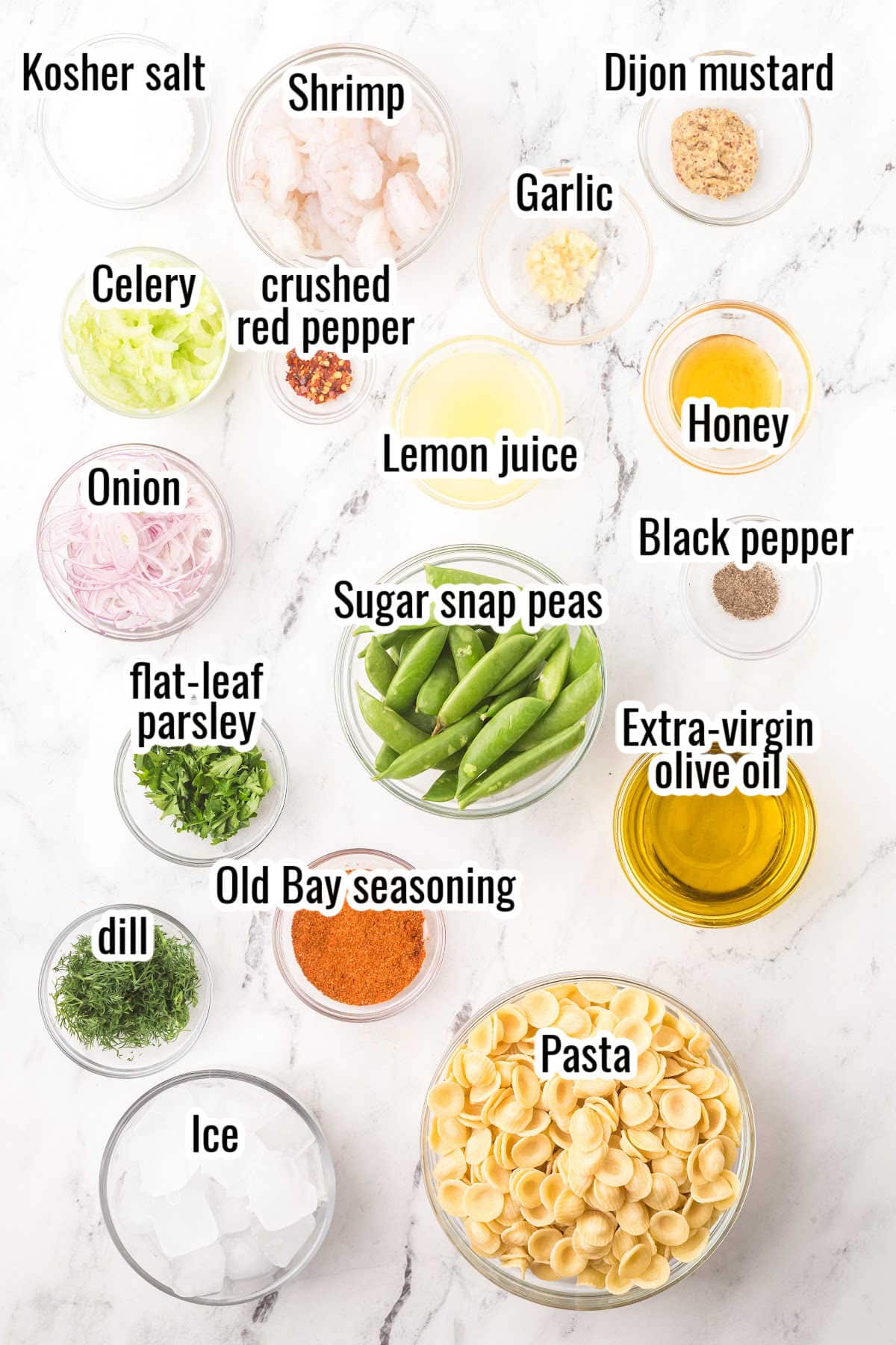 The ingredients needed to make the light spring summer shrimp pasta salad with lemon-herb vinaigrette.