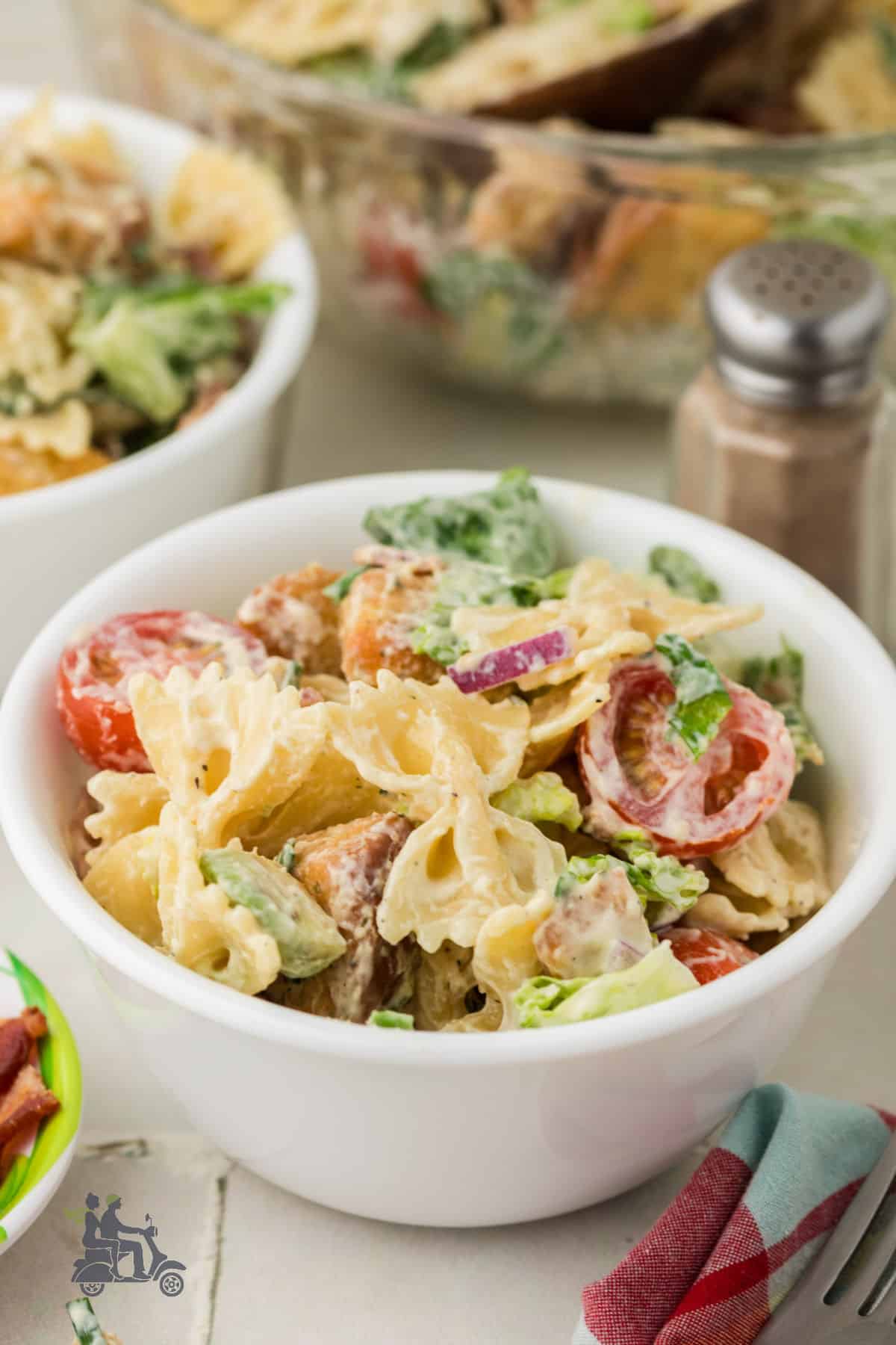 Farfalle pasta tossed with lettuce, bacon, and mustardy ranch dressing.