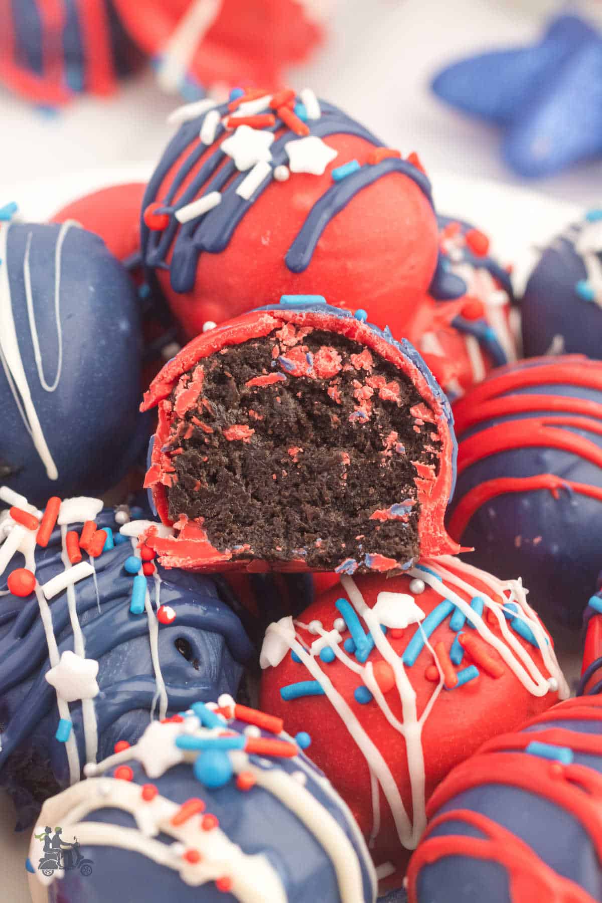 Half of an Oreo truffle ball decorated in the patriotic red, white, and blue.