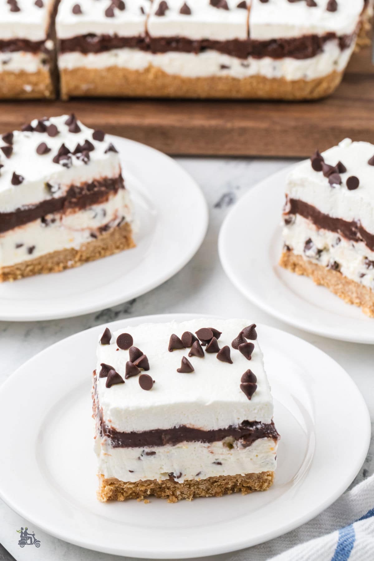 An easy no-bake chocolate lasagna dessert with a crunchy graham cracker crust and layers of creamy filling.