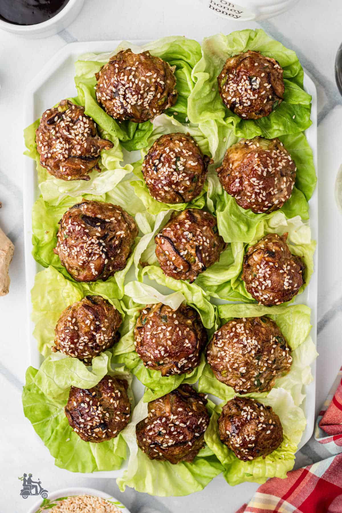 Make-ahead Asian meatball appetizer served in lettuce cups.