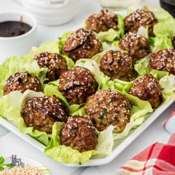 Ground pork and cabbage Asian meatballs in lettuce cups.