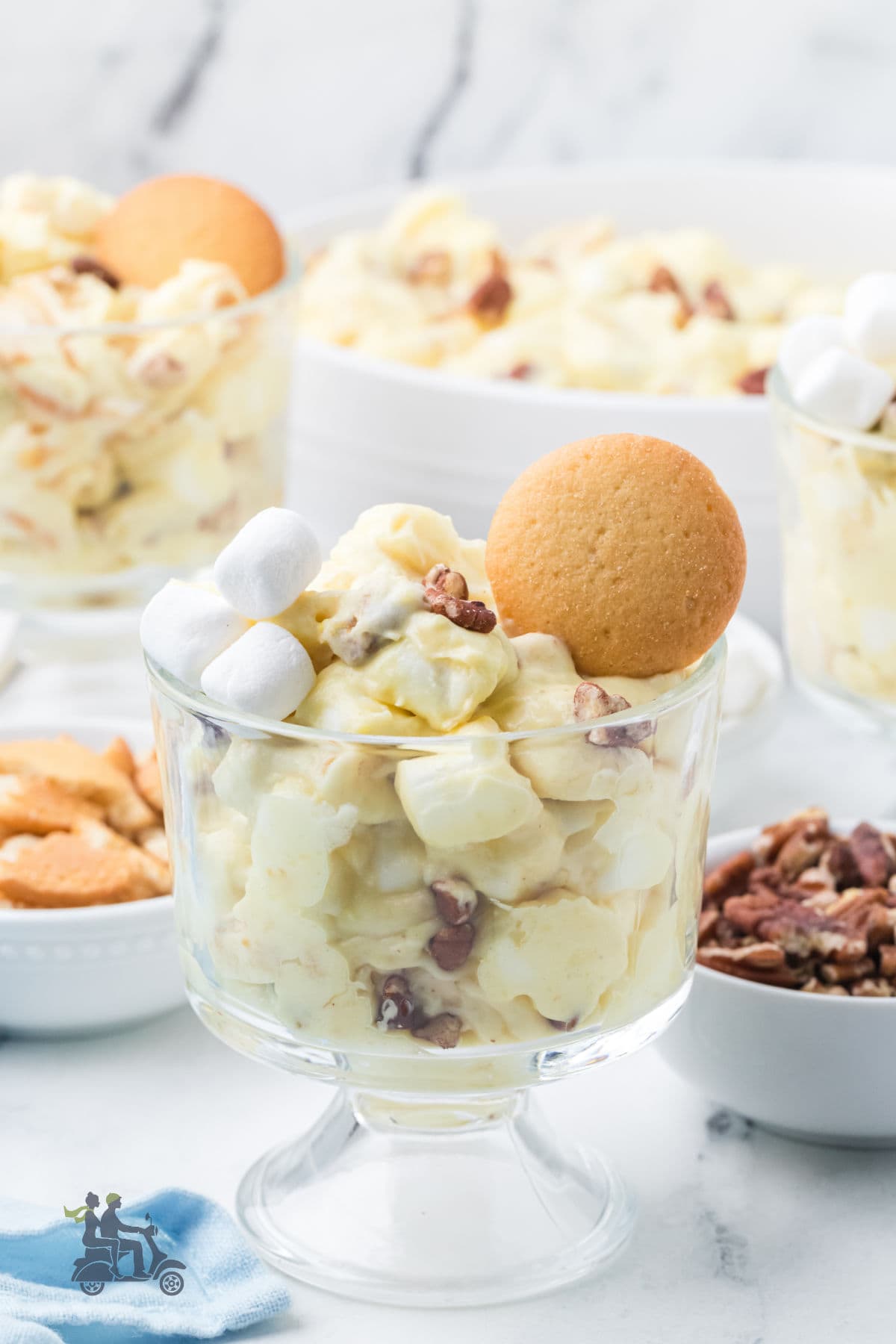 Banana pudding fluff made with mini marshmallows and toasted pecans. 