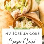 A Pinterest share image with a title overlay for Caesar Salad with chicken in a handheld cone.