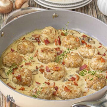 Skillet with Coq au Vin Blanc and turkey meatballs.